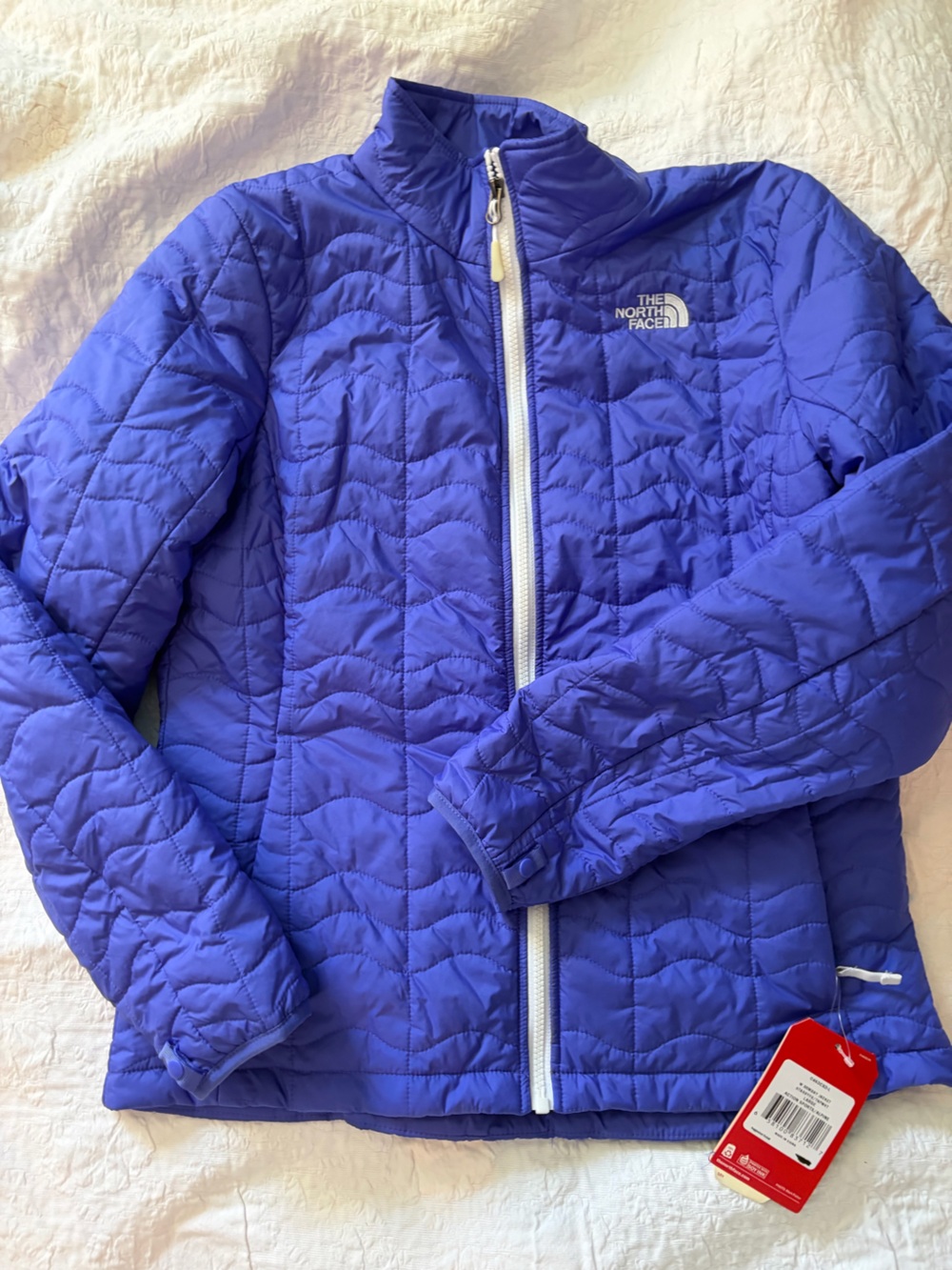 NWT women’s L The North Face Quilted Puffer Jacket - beautiful Blue